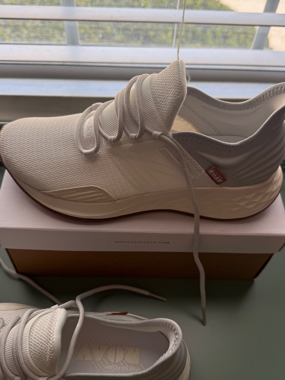 New Balance Women's White Cream Athletic Sneakers